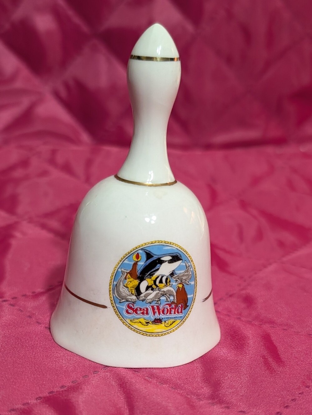 Sea World 1970s souvenir china bell white with gold detailing picture Orca Whale